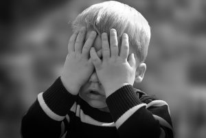 Child hiding face : Lavorocare ASD SUpport Workers : Image CC0 Pixabay